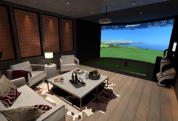 Golf simulator in a lounge with seating